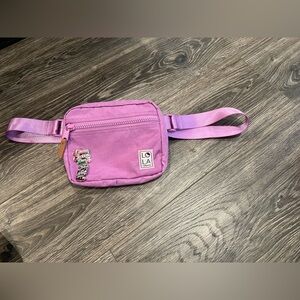 Lola California Moonpie Crossbody Bag In Grape Purple